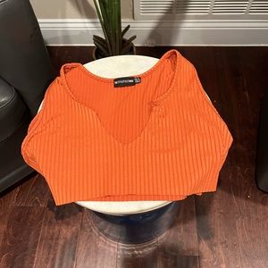 Orange, ribbed, PrettyLittleThing crop top. pumpkin spice color. Size 10/ M
